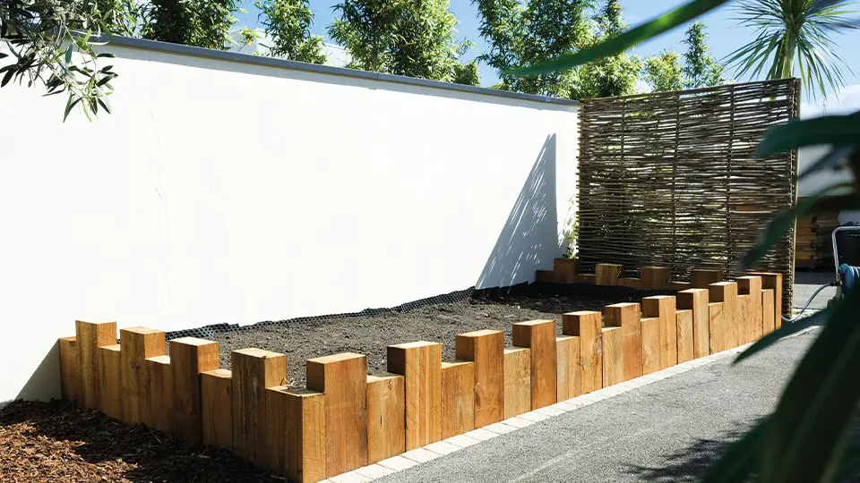 potager avec bord en bois créer par tchanque services